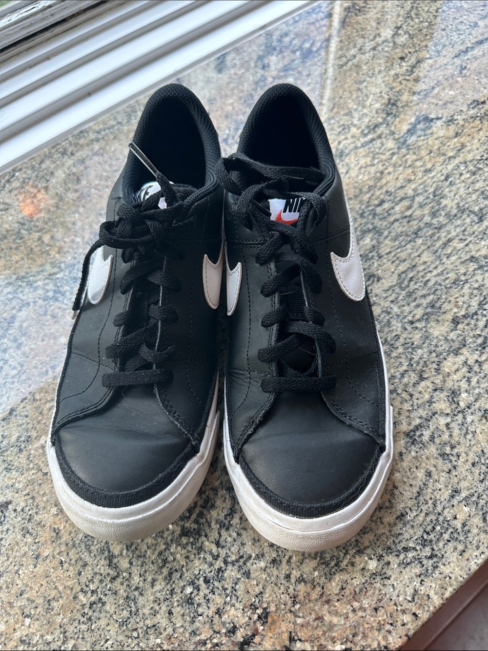 Nike Kids Black Sneakers with White Swoosh
